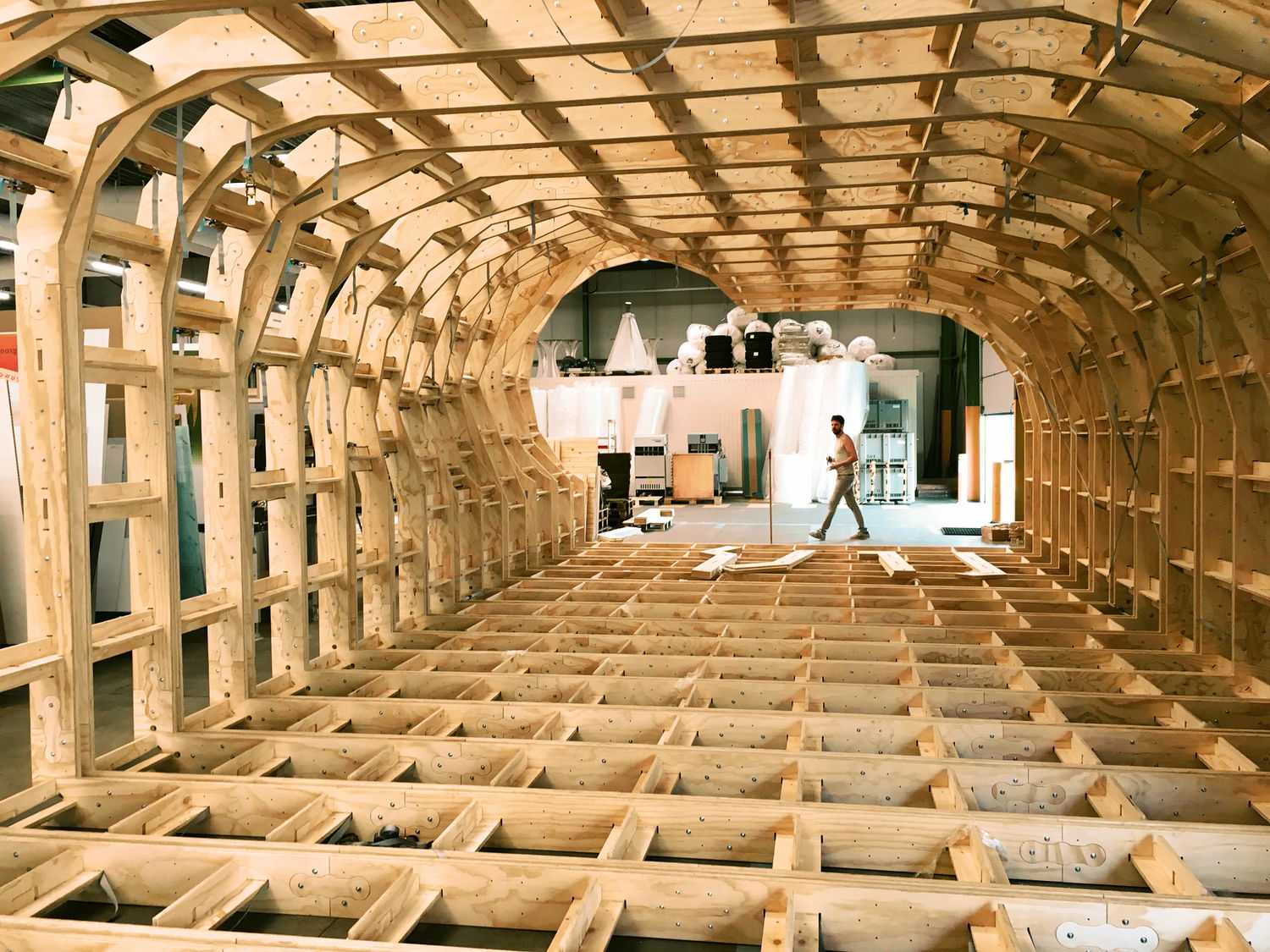 Day five. Looking though the completed first phase in the build. All sections are assembled and bound together with tension belts. The open woodwork clearly outlines the final shape.